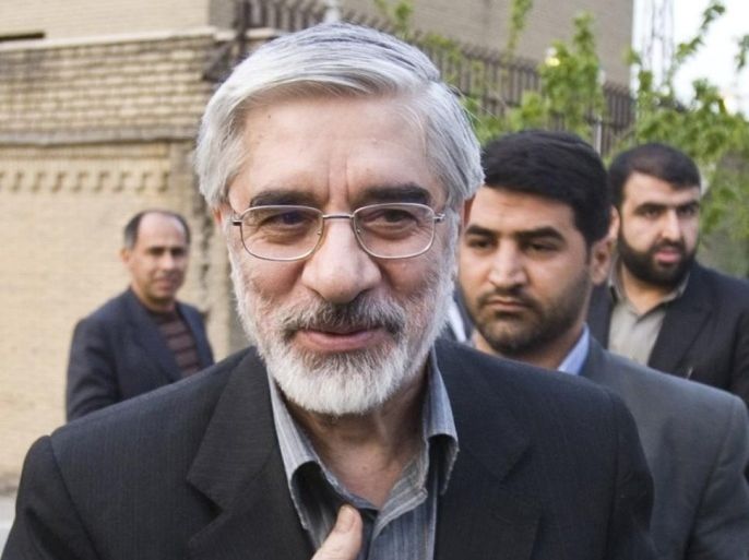 Former Iranian Prime Minister and reformist candidate for Iranian presidential elections Mirhossein Moussavi arrives for a meeting with economists in Tehran April 16, 2009.