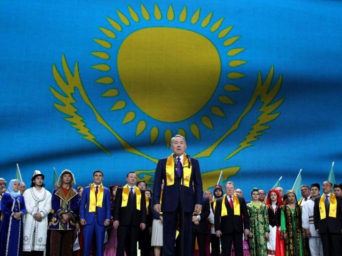 Kazakhstan's President Nursultan Nazarbayev (C) attends a rally in honor of his victory in the presidential election in Astana, Kazakhstan, 27 April 2015. Kazakhstan President Nursultan Nazarbayev was on 27 April headed for his most emphatic election win so far, with results pointing to a plebiscite in favor of an extension to his 25-year reign over the oil-rich former Soviet republic. Nazarbayev won 97.7 per cent of the 26 April vote, in what Election Commission head Kuandyk Turgankulov described as preliminary results.