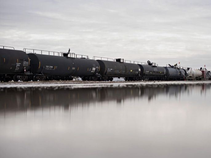 Rail tanker cars sit on tracks at the Red River Supply Inc. rail yard in Williston, North Dakota, U.S., on Friday, Feb. 13, 2015. A plunge in global energy prices that has put some North Dakota oil rigs in a deep freeze has yet to chill the state's hiring climate.