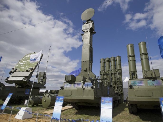 FILE - In this file photo taken on Tuesday, Aug. 27, 2013 a Russian air defense missile system Antey 2500, or S-300 VM, is on display at the opening of the MAKS Air Show in Zhukovsky outside Moscow. Russia has supplied similar systems to Syria. The Kremlin says Russia has lifted its ban on the delivery of a sophisticated air defense missile system to Iran. Russia signed the $800 million contract to sell Iran the S-300 missile system in 2007, but later suspended their delivery because of strong objections from the United States and Israel. The decree signed Monday, April 13, 2015, by President Vladimir Putin allows for the delivery of the missiles. (AP Photo/Ivan Sekretarev, File)