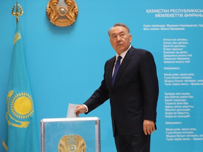 ASTANA, KAZAKHSTAN - APRIL 26 : Presidential candidate and incumbent Kazakh President Nursultan Nazarbayev casts his ballot at a polling station in Astana, Kazakhstan, 26 April 2015. Voting began in Kazakhstan's presidential election, with some 9.5 million people registered to elect a head of state in Kazakhstan.