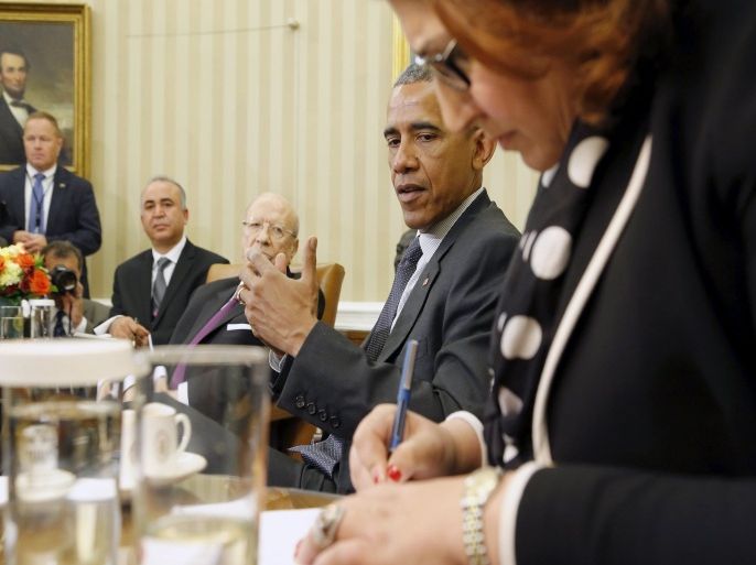 Tunisia's President Beji Caid Essebsi (3rd L) and U.S. President Barack Obama (2nd R) work through interpreters to deliver remarks to reporters after their meeting in the Oval Office at the White House in Washington May 21, 2015. REUTERS/Jonathan Ernst