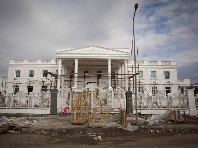 ERBIL, IRAQ - DECEMBER 15: Construction continues the White House a $20 villa being built inside Dream City, a new exclusive residential suburb that is being developed in Erbil on December 15, 2014 in Erbil, Iraq. Dream City, is one of several high value residential areas that have been built in the Kurdistan capital since 2003 and are complete with their own mosque, shopping areas and schools. Property values vary, but many villas in the gated and walled development are now valued at over $1million and it even features a $20million US White House replica. Despite insecurity in the rest of Iraq, the semi autonomous region of Kurdistan has been seen by some investors as the new Dubai and although the advance of Islamic State and a budget row with Baghdad has dampened some of the enthusiasm, the city skyline is still changing at a rapid pace.