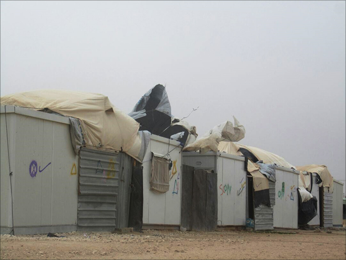 عدد من اللاجئين العمال عادوا إلى مخيم الزعتري (الجزيرة)