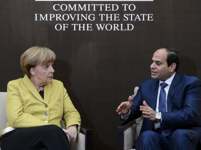 Egyptian President Abdel-Fattah al-Sissi (R) talks with German Chancellor Angela Merkel during a bilateral meeting on the sideline of the 45th Annual Meeting of the World Economic Forum in Davos January 22, 2015. Sisi called on world leaders gathered at the World Economic Forum on Thursday to unite against the global threat of terrorism. More than 1,500 business leaders and 40 heads of state or government will attend the Jan. 21-24 meeting of the World Economic Forum (WEF) to network and discuss big themes, from the price of oil to the future of the Internet. This year they are meeting in the midst of upheaval, with security forces on heightened alert after attacks in Paris, the European Central Bank considering a radical government bond-buying programme and the safe-haven Swiss franc rocketing. REUTERS/Fabrice Coffrini/Pool (SWITZERLAND - Tags: POLITICS BUSINESS)