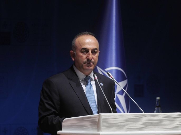 ANTALYA, TURKEY - MAY 14: Turkish Foreign Minister Mevlut Cavusoglu holds a press conference during the second day of NATO Foreign Ministers meeting in Antalya, Turkey on May 14, 2015.
