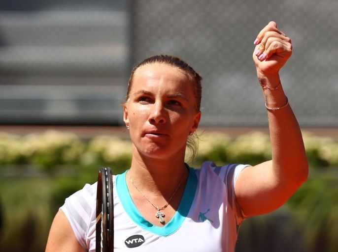 MADRID, SPAIN - MAY 08: Svetlana Kuznetsova of Russia celebrates to the crowd after her straight sets victory against Maria Sharapova of Russia in their semi final match during day seven of the Mutua Madrid Open tennis tournament at the Caja Magica on May 8, 2015 in Madrid, Spain.