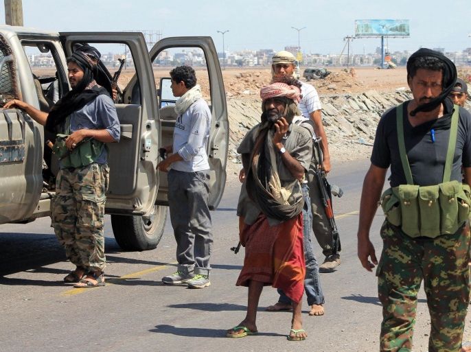 Armed tribal supporters of exiled Yemeni President Abedrabbo Mansour Hadi stand near the International airport in the port city of Aden, as they continue to battle Shiite Huthi rebels, on May 2, 2015. UN Secretary-General Ban Ki-moon has warned that fuel shortages could bring all relief operations to a halt 'within days,' echoing alarm from the International Red Cross and other embattled aid agencies. AFP PHOTO / SALEH AL-OBEIDI