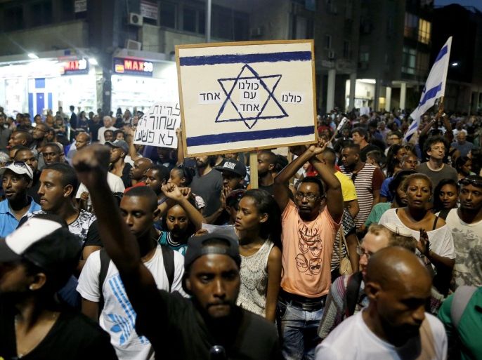 Israelis members of the Ethiopian community during a protest against racism and what they say is excessive aggression by Israeli police, in central Tel Aviv, Israel, 18 May 2015. Several hundred members of the Ethiopian community blocked roads, shouted slogans and called for equality and a halt of excessive police violence.