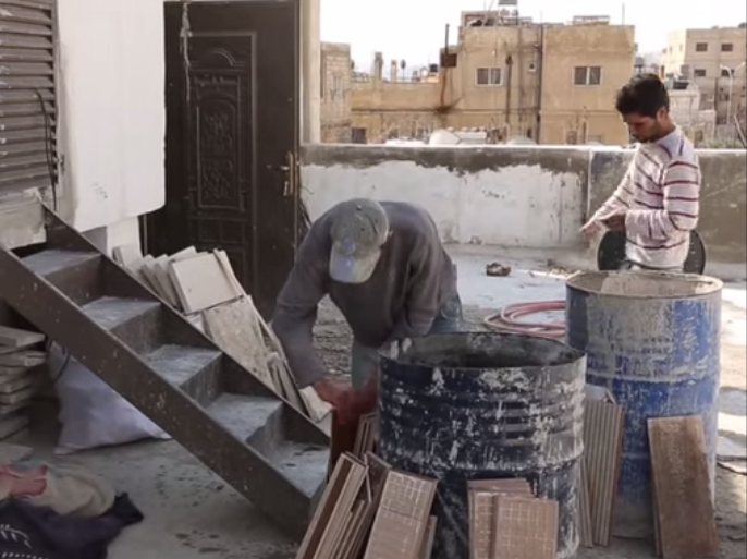 الأردن عمال سوريون في قطاع البناء