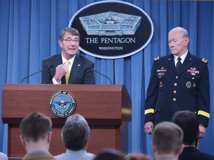 US Defense Secretary Ashton Carter (L) speaks during a press briefing with US Chairman of the Joint Chiefs of Staff Martin Dempsey (R) at the Pentagon on May 7, 2015 in Washington, DC. AFP PHOTO/Mandel NGAN