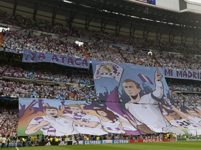 MADRID, SPAIN - MAY 13: Supporters of Real Madrid are seen before the UEFA Champions League semifinal second leg soccer match between Real Madrid and Juventus FC at the Santiago Bernabeu stadium in Madrid, Spain, on May 13, 2015.