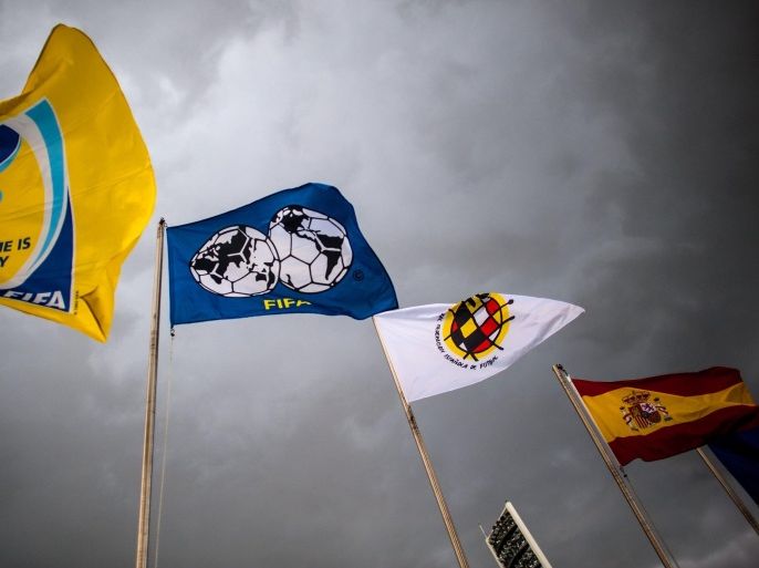 LAS ROZAS DE MADRID, SPAIN - MAY 28: Flags of Spain, Spain Football Federation and FIFA are seen at Ciudad del Futbol on May 28, 2014 in Las Rozas de Madrid, Spain.