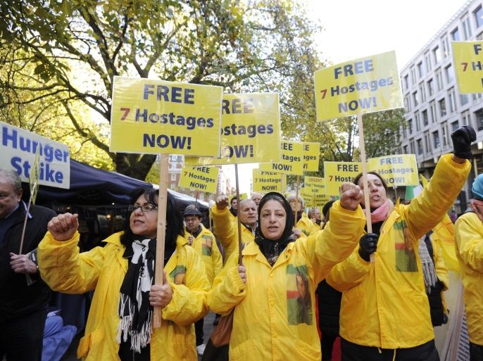 Supporters of the National Council of Resistance of Iran (NCRI), demonstrate outside the American Embassy in Central London, Britain, 19 November 2013. The protest organized in support of the international campaign 'Free 7 Ashraf Hostages', which is demanding the immediate release of the seven Iranian dissidents taken hostage by the Iraqi Prime Minister's Special Forces during the massacre in Camp Ashraf on 01 September, continues outside the US embassy.