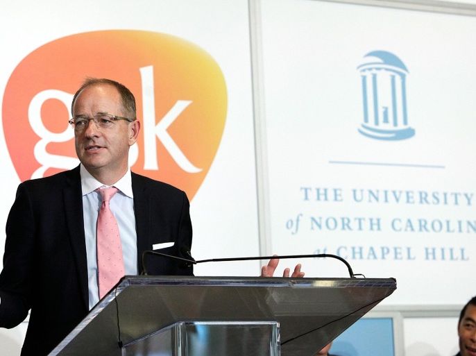 GlaxoSmithKline CEO Andrew Witty speaks at the University of North Carolina at Chapel Hill on Monday, May 11, 2015 to announce a partnership with the university to accelerate the search for an HIV cure, in Chapel Hill, N.C. The partnership will establish a dedicated HIV Cure center at UNC and a jointly-owned company, Qura Therapeutics. (Christine T. Nguyen/The Herald-Sun via AP)