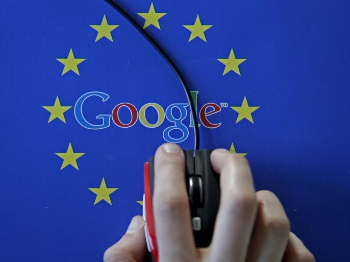 A woman hovers a mouse over the Google and European Union logos in Sarajevo, in this April 15, 2015 photo illustration. The European Union accused Google Inc on Wednesday of cheating competitors by distorting Internet search results in favour of its Google Shopping service and also launched an antitrust probe into its Android mobile operating system. REUTERS/Dado Ruvic