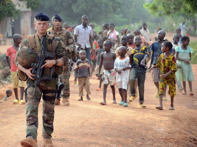 French soldiers patrol a street in Bangui, part of 'Operation Sangaris', on May 2, 2015. Faced with mounting pressure to shed light on accusations that French soldiers sexually abused children in the Central African Republic, the United Nations said May 1, 2015 suggestions of a cover-up were 'offensive'. AFP PHOTO / PACOME PABANDJI
