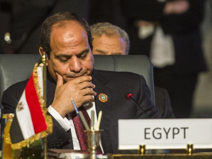 Egypt's President Abdel Fattah al-Sisi attends the closing session of an African summit meeting in the Egyptian resort of Sharm el-Sheikh on June 10, 2015. Senior African officials were negotiating a trade deal in Egypt to create a common market across half the continent, with the aim of raising Africa's share of global trade -- currently at about two percent. The deal between the East African Community, Southern African Development Community and the Common Market for Eastern and Southern Africa (COMESA) would create a 26-country market with a population of 625 million and gross domestic product worth more than $1 trillion (900 billion euros). AFP PHOTO / KHALED DESOUKI