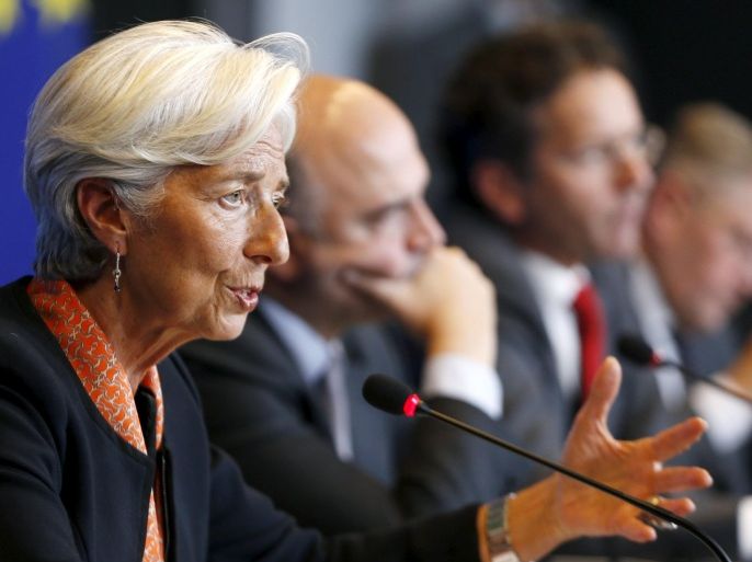 (L-R) International Monetary Fund (IMF) Managing Director Christine Lagarde, European Economic and Financial Affairs Commissioner Pierre Moscovici, Dutch Finance Minister and Eurogroup chairman Jeroen Dijsselbloem and European Stability Mechanism Managing Director Klaus Regling address a joint news conference after a Euro zone finance ministers meeting in Luxembourg, June 18, 2015. REUTERS/Francois Lenoir
