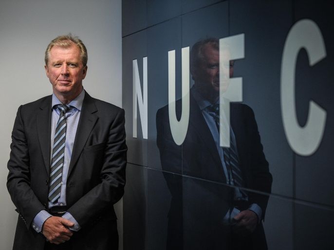 NEWCASTLE UPON TYNE, ENGLAND - JUNE 10: Newcastle United's New Head Coach Steve McClaren poses for photographs with the NUFC sign at St.James' Park during the Newcastle United Photo call on June 10, 2015, in Newcastle upon Tyne, England.