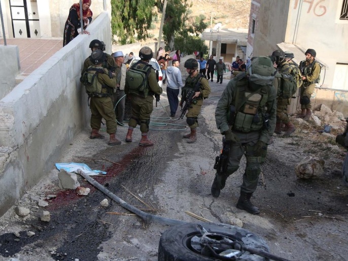 مواجهات سابقة لشبان فلسطينيين مع قوات الاحتلال الإسرائيلي في بلدة كفر مالك شمال شرق رام الله بالضفة الغربية (الأناضول)