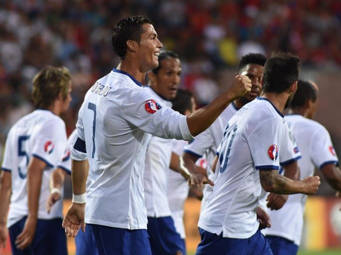 Cristiano Ronaldo (C) of Portugal reacts during UEFA Euro 2016 qualifying match against Armenia at Vazgen Sargsyan Republican Stadium in Yerevan, Armenia 13 June 2015.