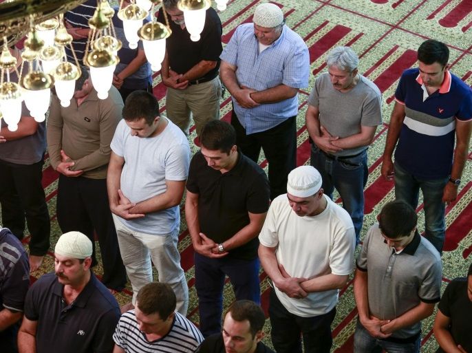 NEW YORK, UNITED STATES - JUNE 17: Muslims perform the first 'Tarawih' prayer on this year's eve of Islamic holy month of Ramadan at the Abu Ayyub Mosque in Brrooklyn, New York on June 17, 2015.