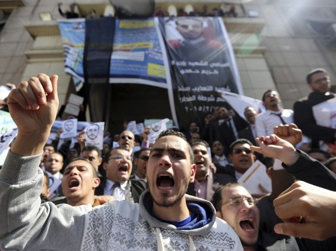 Lawyers shout slogans against the Interior Ministry during a protest in front of the Lawyers Syndicate headquarters in Cairo, March 1, 2015, after the death of lawyer Karim Hamdy in the Police Department last week.Two Egyptian policemen accused of killing a lawyer in custody were detained on Thursday on the orders of an Egyptian prosecutor, judicial sources said, a rare action against members of the security forces. REUTERS/Mohamed Abd El Ghany (EGYPT - Tags: POLITICS CIVIL UNREST)