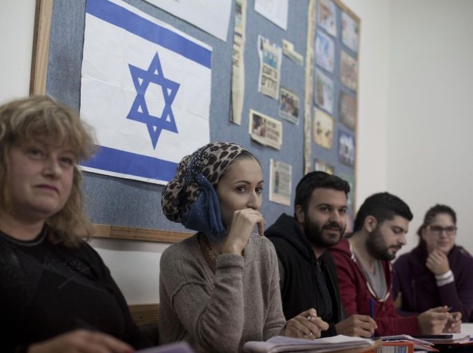 NETAYA, ISRAEL - MARCH 12: Newly arrived immigrants from France study Hebrew at Ulpan on March 12, 2015 in Netanya, Israel. The recent wave of anti-Semetism that has swept over France and the string of terror attacks in Paris are expected to lead to a record-breaking number of French jews that will emigrate to Israel. In 2014 about 7000 Jews moved from France to Israel.