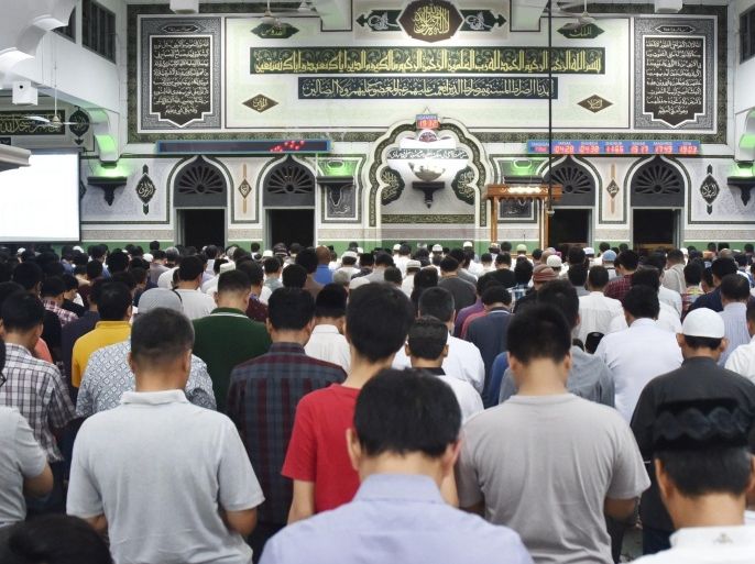 Indonesian Muslims take part in the first day of Ramadan prayers at Al-azhar Mosque in Jakarta on June 17, 2015, to mark the Muslim holy fasting month. More than 1.5 billion Muslims around the world will mark the month, during which believers abstain from eating, drinking, smoking and having sex from dawn until sunset. AFP PHOTO / Bay ISMOYO