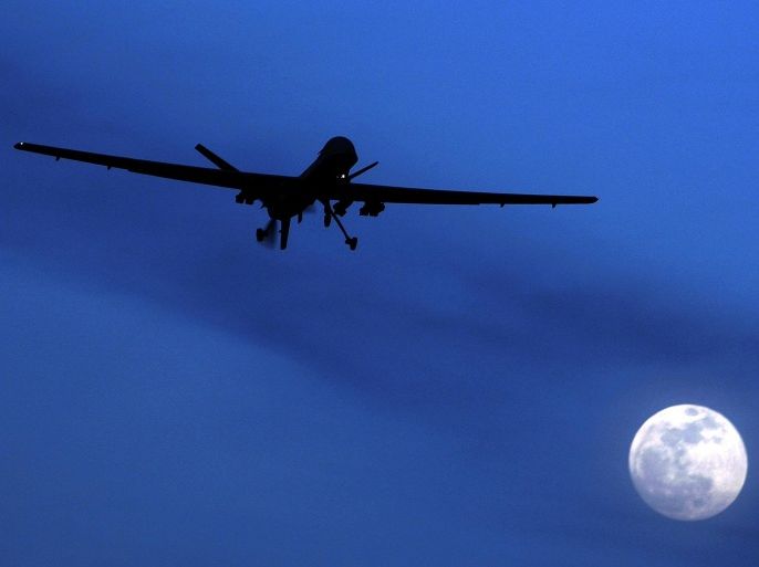 FILE - In this Jan. 31, 2010, file photo, an unmanned U.S. Predator drone flies over Kandahar Air Field, southern Afghanistan on a moonlit night. The Obama administration is amending its regulations for weapons sales to allow the export of armed military drones to friendly nations and allies. The State Department said Tuesday, Feb. 17, 2015, the new policy would allow foreign governments that meet certain requirements — and pledge not to use the unmanned aircraft illegally — to buy the vehicles that have played a critical but controversial role in combating terrorism and are increasingly used for other purposes. (AP Photo/Kirsty Wigglesworth, File)