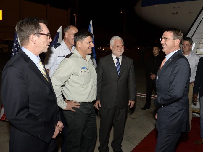 A handout photo provided by the US Embassy in Tel Aviv shows US Secretary of Defense Ashton Carter (R) arriving in Tel Aviv, Israel, 19 July 2015. Carter is in Israel to discuss security needs with Israeli Prime Minister Benjamin Netanyahu. Carter was also due to meet his Israeli counterpart, Moshe Yaalon. After Israel, Carter is to continue to Saudi Arabia and Jordan, in a bid to reassure key Middle Eastern allies on the nuclear deal with Iran. EPA/MATTY STERN / HANDOUT