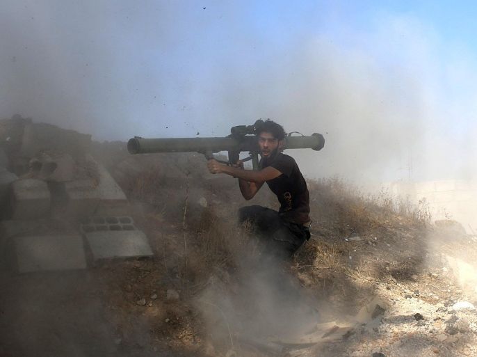 DAMASCUS, SYRIA - JULY 25: Members of opposition ar-Rahman Brigade attack with RPGs to one of the Assad's regime forces' base in East Ghouta, Damascus, Syria on July 25, 2015.