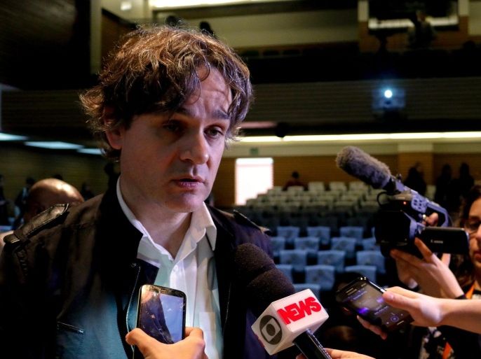'Charlie Hebdo' magazine publishing director Laurent Sourisseau 'Riss', talks to the press after a conference titled "Charlie Hebdo: how to keep humor after the massacre" during the the 10th Investigative Journalism International Congress, in Sao Paulo, Brazil, on 4 July 2015.