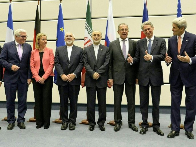 (L-R) Chinese Foreign Minister Wang Yi, French Foreign Minister Fabius Laurent, German Foreign Minister Frank-Walter Steinmeier, High Representative of the European Union for Foreign Affairs and Security Policy Federica Mogherini, Iranian Foreign Minister Mohammad Javad Zarif, Russian Foreign Minister Sergei Lavrov, British Foreign Secretary Philip Hammond and US Secreatary of State John Kerry during a press conference in the course of the talks between the E3+3 (France, Germany, UK, China, Russia, US) and Iran in Vienna, Austria, 14 July 2015. Foreign ministers from six world powers and Iran finally achieved an agreement to prevent the Islamic republic from developing nuclear weapons, Western diplomats said in Vienna on 14 July 2015.