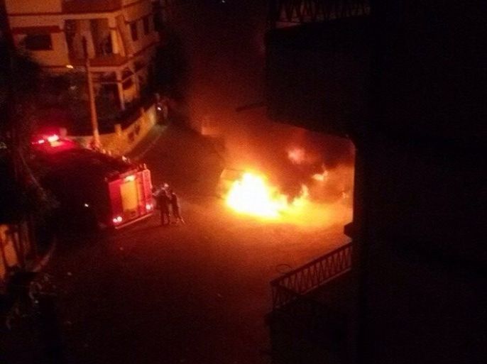 إحدى السيارات المحترقة في اللاذقية