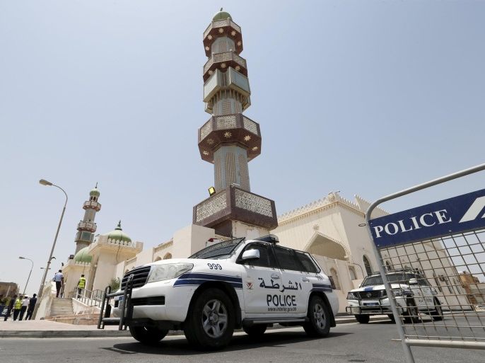 Police vehicles are parked outside the Al A'ali Grand Mosque where joint Sunni and Shi'ites prayers are to be held to show solidarity and co-existence between the two sects of Islam, ahead of Friday prayers in Al A'ali south of Manama, July 3, 2015. Following three bombings of Shi'ite mosques by the Islamic State militant group in Saudi Arabia and Kuwait since May 22, Sunnis and Shi'ites in Kuwait and in Bahrain will pray together in main mosques, as a sign of national unity and in a challenge to the militant group, which is expanding, notably in Egypt, Libya and Yemen, from its strongholds in Iraq and Syria. REUTERS/Hamad I Mohammed