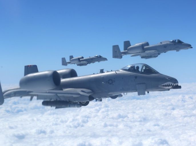 A-10 Warthogs line up off of the left wing of a KC-135 Stratotanker from the 6th Air Mobility Wing MacDill AFB to practice hooking and unhooking up to the air refueling tanker. The exercise took place at 20,000 feet near Valdosta Ga on Wednesday afternoon March 12, 2014. The KC-135 is based at MacDill and the A-10's are from Moody AFB Georgia. Tampa Bay AirFest 2014 is March 22-23 and both A-10's and KC-135's will be on display. The A-10 was designed to destroy tanks and armored personal carries and give close support to troops on the ground (AP Photo/The Tampa Bay Times, Skip O'Rourke)
