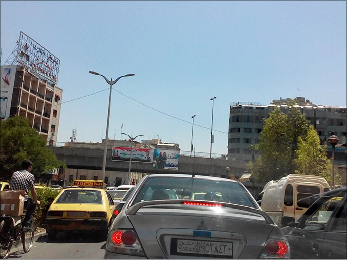 حملات المناصرة للجيش والتشكيلات المقاتلة لجانب النظام تنتشر في شوارع دمشق (الجزيرة)