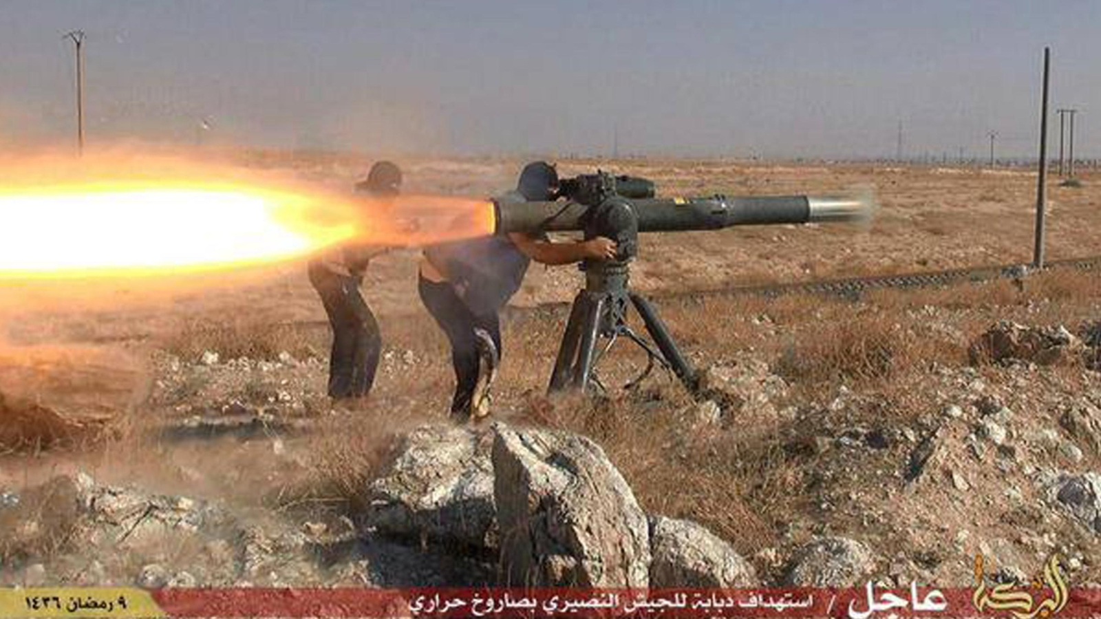 صورة نشرها تنظيم الدولة لاستهداف آلية لجيش النظام السوري بصاروخ موجه (أسوشيتد برس)