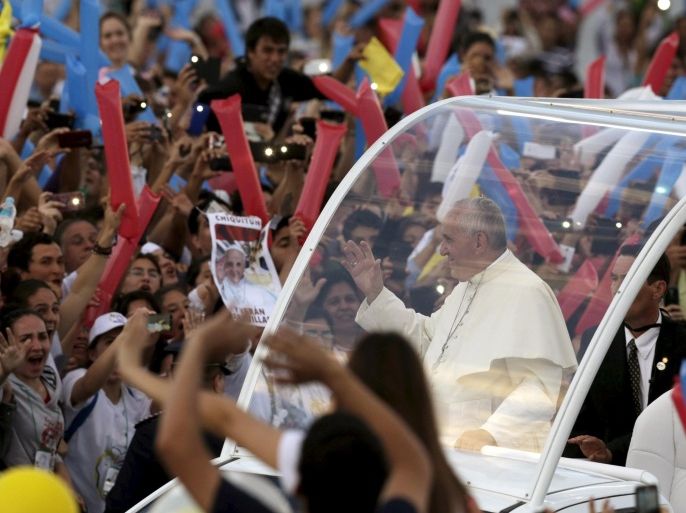 Pope Francis waves as he arrives to meet with youths in Asuncion, Paraguay, July 12, 2015. The Argentine pontiff, who is wrapping up his three-country tour of South America, has made defending the poor a major theme of his "homecoming" trip, which also took him to Ecuador and Bolivia, ranked among Latin America's poorest countries. REUTERS/Jorge Adorno TPX IMAGES OF THE DAY TPX IMAGES OF THE DAY