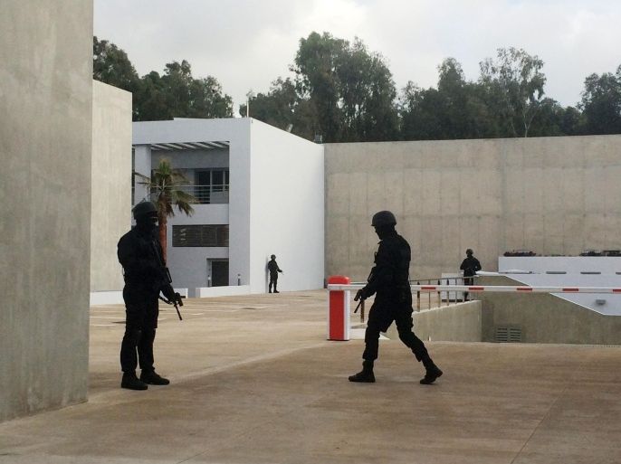 Moroccan special anti-terror units patrol the newly-opened headquarters of the Central Bureau of Judicial Investigations on March 23, 2015 in Sale, Morocco. The bureau dismantled a militant network linked to the Islamic State seeking to kidnap political and military figures. (AP Photo/Paul Schemm)