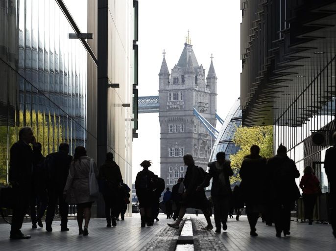 (FILE) A file photo dated 23 April 2014 shopwing City workers walking towards Tower Bridge during the rush hour in London, Britain. The British economy has recovered the ground it lost in the 2008-09 financial crisis after it expanded 0.8 per cent quarter-on-quarter in the second quarter, data released 24 July 2014 showed. The preliminary reading of gross domestic product (GDP) put economic output at 0.2 per cent over the pre-crisis economic peak Britain had achieved in early 2008, the government's independent National Statistics Office said. The British economy has now expanded six quarters in a row, including by 0.8 per cent in the first quarter. The data was released a day after the IMF raised its forecast for British economic growth for this year to 3.2 per cent, the highest prediction for any of the major world economies.