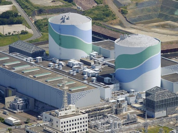 This aerial photo shows reactors of No. 1, right, and No. 2, left, at the Sendai Nuclear Power Station in Satsumasendai, Kagoshima prefecture, southern Japan, Tuesday, Aug. 11, 2015. Kyushu Electric Power Co. said Tuesday, Aug. 11, 2015, it had restarted the No. 1 reactor at its Sendai nuclear plant as planned. The restart marks Japan's return to nuclear energy four-and-half-years after the 2011 meltdowns at the Fukushima Dai-ichi nuclear power plant in northeastern Japan following an earthquake and tsunami.(Kyodo News via AP) JAPAN OUT, MANDATORY CREDIT