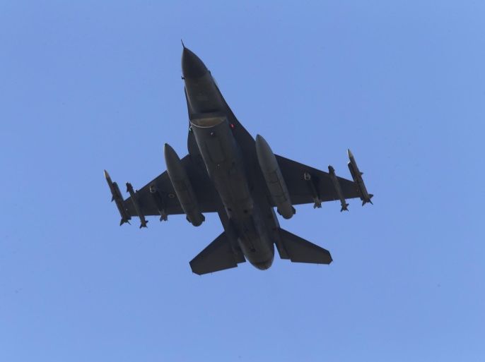 FILE - in this Wednesday, July 29, 2015 file photo, a missile-loaded Turkish Air Force warplane rises in the sky after taking off from Incirlik Air Base, in Adana, southern Turkey. The killing of two police officers by alleged Kurdish rebels prompted the Turkish government to retaliate against the Kurdistan Workers Party, PKK, with airstrikes to strongholds which stretch from southeastern Turkey to northern Iraq. In an abrupt reversal, Turkey and the Kurdish rebels appear to be hurtling toward the return of an all-out conflict that plagued the nation for decades, before a fragile peace process was launched in 2012. (AP Photo/Emrah Gurel, file)