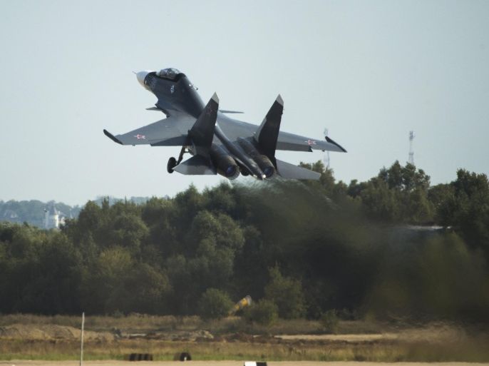 Russian air force Su-30MKI fighter jet takes off during the MAKS-2015 International Aviation and Space Show in Zhukovsky, outside Moscow, Russia, Wednesday, Aug. 26, 2015. The XII International Aviation and Space Show in Zhukovsky opened Tuesday for specialists and press, with members of the public invited to visit it from Friday, Aug. 28. (AP Photo/Pavel Golovkin)