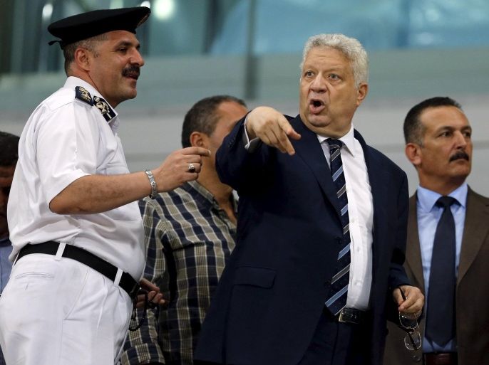 El Zamalek Chairman Mortada Mansour (C) argues with security during their Egyptian Premier League derby soccer match against Al-Ahly at Borg El Arab "Army" Stadium, west of the Mediterranean city of Alexandria, July 21, 2015. The match was played without spectators due to security reasons. REUTERS/Amr Abdallah Dalsh