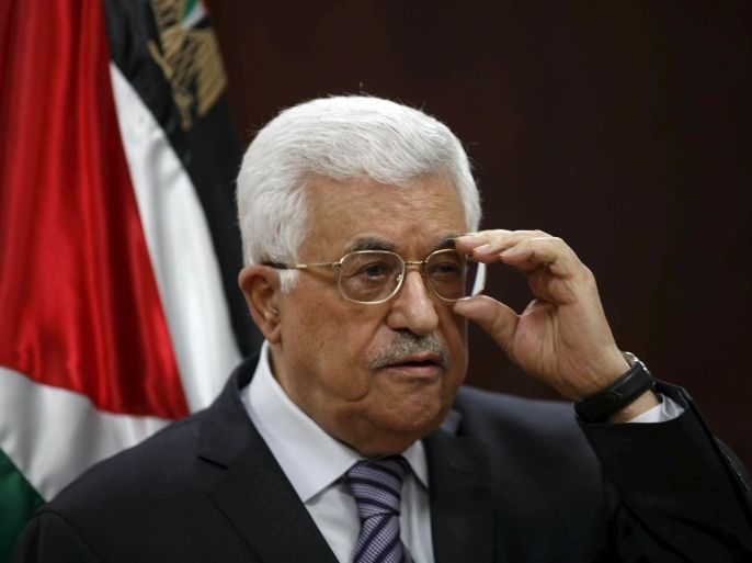 Palestinian President Mahmoud Abbas speaks to journalists during a news conference in his headquarters in the West Bank city of Ramallah July 31, 2015. Suspected Jewish attackers torched a Palestinian home in the occupied West Bank on Friday, killing an 18-month-old toddler and seriously injuring three other family members, an act that Israel's prime minister described as terrorism. REUTERS/Mohamed Torokman