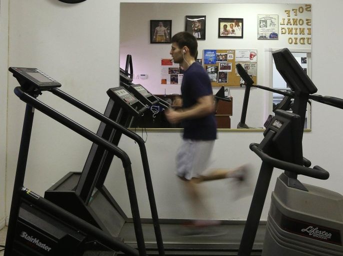 TORONTO, ON - MARCH 26: Arthur Biyarslanov runs on the treadmill to warm up. Biyarslanov is a new Canadian originally from Chechnya who will be boxing for Canada at the Pan Am Games. He used sport to help intergrate into his new country after arriving with his mother. (Steve Russell/Toronto Star via Getty Images)