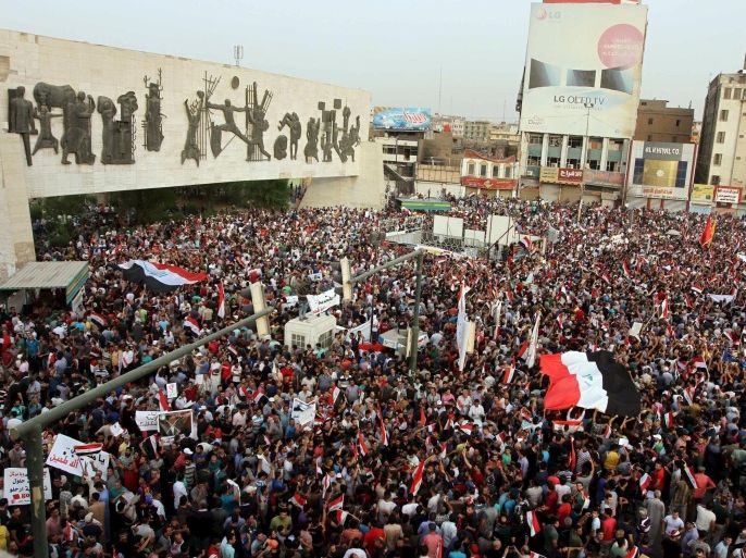 People shout slogans during a demonstration against corruption and poor services in regard to power cuts and water shortages, at Tahrir Square in central Baghdad, Iraq, August 7, 2015. Iraq's top Shi'ite Muslim cleric Grand Ayatollah Ali al-Sistani called on the prime minister on Friday to "strike with an iron fist" those who engage in corruption, adding his voice to protests against officials who many Iraqis blame for power cuts. Iraqis fed up with unreliable power in sweltering heat surpassing 50 degrees Celsius and years of corruption have demonstrated in Baghdad and cities in the south in recent weeks. REUTERS/Stringer NO ARCHIVES